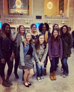 (IWL Director, Rachel Ferreira, featured with IWL Panel Members and Nichols Students in Grand Central Station, New York City before their tour of UN Headquarters) 