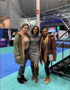Marsha Johnson '19 and Mercy Jubin '20 pictured with Shayna Seymour Carr at the 2019 Massachusetts Conference for Women in Boston, MA. 