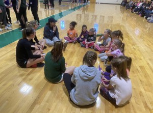 One of the groups getting to know each other with members of the NC women's ice hockey and soccer teams. 